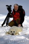 Tourist with seal cub